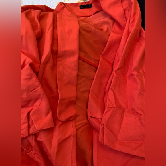 Jacket orange beautiful light. Just wrinkled. - Picture 1 of 1